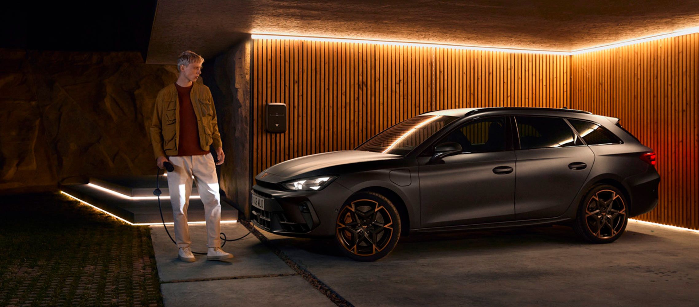 plug in hybrid car, cupra leon sportstourer parked in a garage with ambient lighting